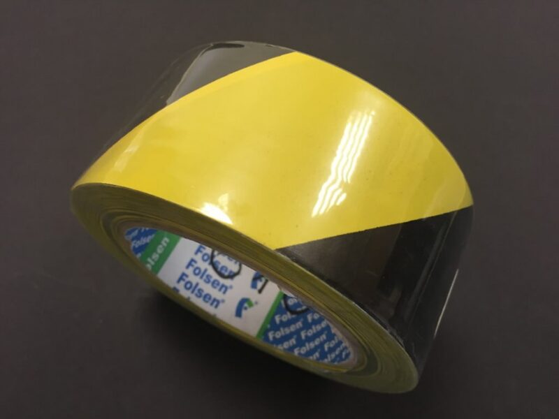 Lente (ar līmi), melna/dzeltena 50mmx33m, Folsen